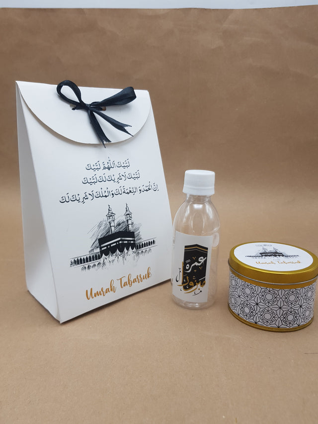 Hajj & Umrah Tabarruk Gift Set β Customized Bag, Tin Box & Zamzam Bottle (Complete Package)