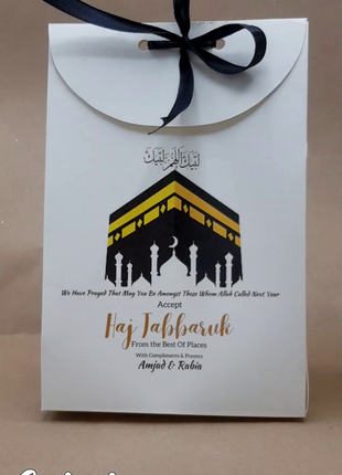 Hajj & Umrah Tabarruk Gift Set – Customized Bag, Tin Box & Zamzam Bottle (Complete Package)