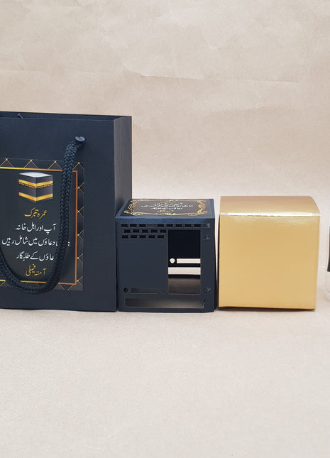 Hajj & Umrah Tabarruk Gift Set – Customized Bag, Tin Box & Zamzam Bottle (Complete Package)