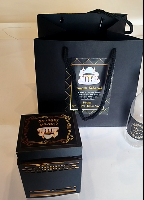 Hajj & Umrah Tabarruk Gift Set – Customized Bag, Tin Box & Zamzam Bottle (Complete Package)