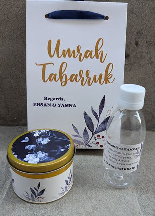 Hajj & Umrah Tabarruk Gift Set – Customized Bag, Tin Box & Zamzam Bottle (Complete Package)