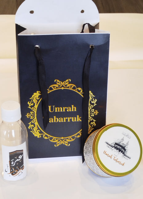 Hajj & Umrah Tabarruk Gift Set – Customized Bag, Tin Box & Zamzam Bottle (Complete Package)