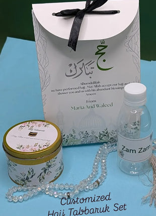 Hajj & Umrah Tabarruk Gift Set – Customized Bag, Tin Box & Zamzam Bottle (Complete Package)