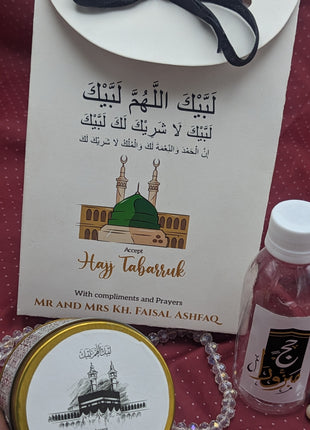Hajj & Umrah Tabarruk Gift Set – Customized Bag, Tin Box & Zamzam Bottle (Complete Package)