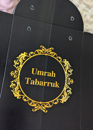 Hajj & Umrah Tabarruk Gift Set – Customized Bag, Tin Box & Zamzam Bottle (Complete Package)