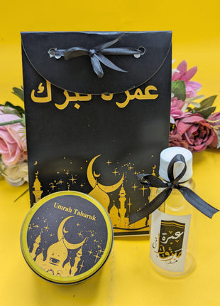 Hajj & Umrah Tabarruk Gift Set – Customized Bag, Tin Box & Zamzam Bottle (Complete Package)