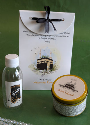 Hajj & Umrah Tabarruk Gift Set – Customized Bag, Tin Box & Zamzam Bottle (Complete Package)