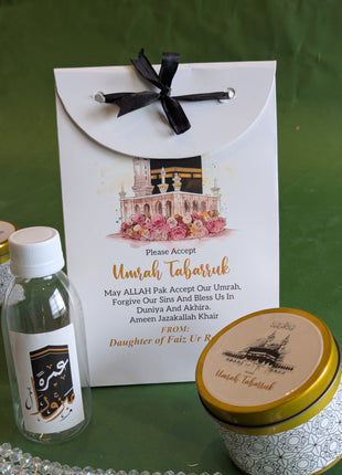 Hajj & Umrah Tabarruk Gift Set – Customized Bag, Tin Box & Zamzam Bottle (Complete Package)