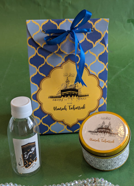 Hajj & Umrah Tabarruk Gift Set – Customized Bag, Tin Box & Zamzam Bottle (Complete Package)