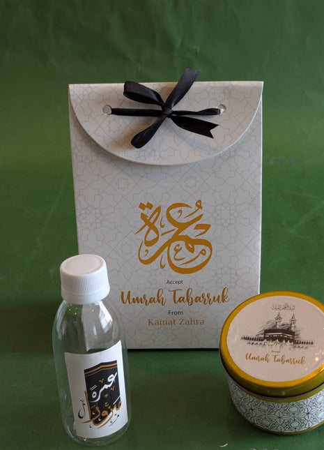 Hajj & Umrah Tabarruk Gift Set – Customized Bag, Tin Box & Zamzam Bottle (Complete Package)