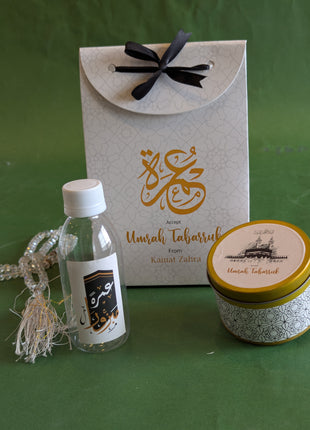 Hajj & Umrah Tabarruk Gift Set – Customized Bag, Tin Box & Zamzam Bottle (Complete Package)