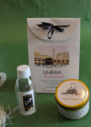 Hajj & Umrah Tabarruk Gift Set – Customized Bag, Tin Box & Zamzam Bottle (Complete Package)