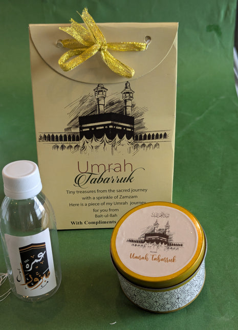 Hajj & Umrah Tabarruk Gift Set – Customized Bag, Tin Box & Zamzam Bottle (Complete Package)
