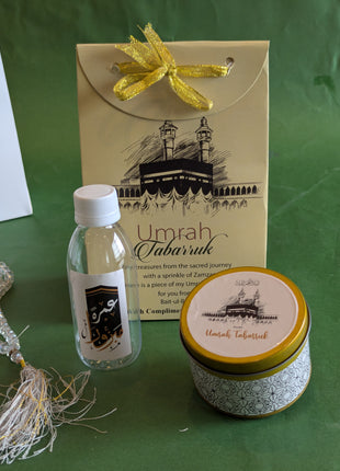 Hajj & Umrah Tabarruk Gift Set – Customized Bag, Tin Box & Zamzam Bottle (Complete Package)