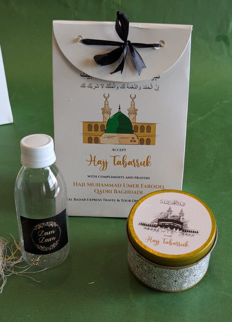 Hajj & Umrah Tabarruk Gift Set – Customized Bag, Tin Box & Zamzam Bottle (Complete Package)
