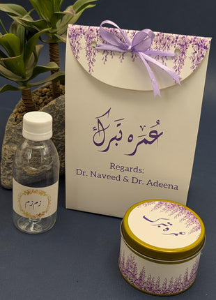 Hajj & Umrah Tabarruk Gift Set – Customized Bag, Tin Box & Zamzam Bottle (Complete Package)