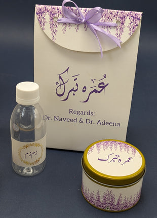 Hajj & Umrah Tabarruk Gift Set – Customized Bag, Tin Box & Zamzam Bottle (Complete Package)
