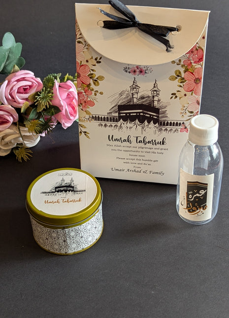 Hajj & Umrah Tabarruk Gift Set – Customized Bag, Tin Box & Zamzam Bottle (Complete Package)