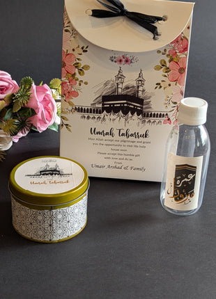 Hajj & Umrah Tabarruk Gift Set – Customized Bag, Tin Box & Zamzam Bottle (Complete Package)
