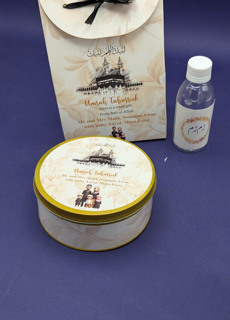 Hajj & Umrah Tabarruk Gift Set – Customized Bag, Tin Box & Zamzam Bottle (Complete Package)