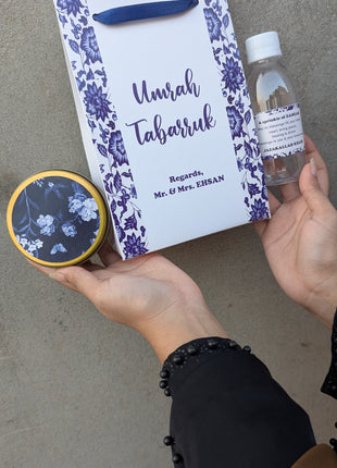 Hajj & Umrah Tabarruk Gift Set – Customized Bag, Tin Box & Zamzam Bottle (Complete Package)