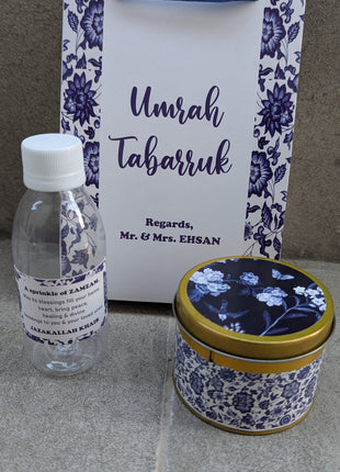 Hajj & Umrah Tabarruk Gift Set – Customized Bag, Tin Box & Zamzam Bottle (Complete Package)