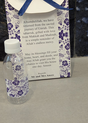 Hajj & Umrah Tabarruk Gift Set – Customized Bag, Tin Box & Zamzam Bottle (Complete Package)