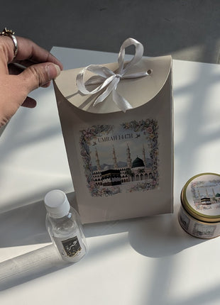 Hajj & Umrah Tabarruk Gift Set – Customized Bag, Tin Box & Zamzam Bottle (Complete Package)