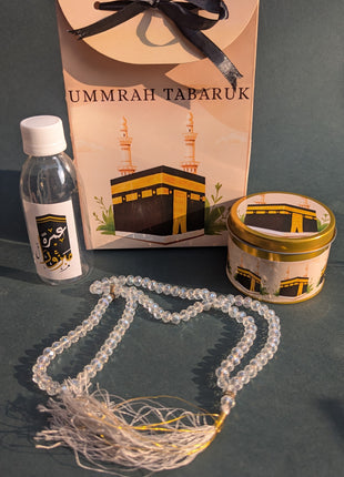 Hajj & Umrah Tabarruk Gift Set – Customized Bag, Tin Box & Zamzam Bottle (Complete Package)