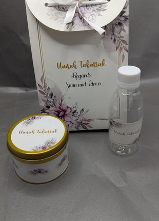 Hajj & Umrah Tabarruk Gift Set – Customized Bag, Tin Box & Zamzam Bottle (Complete Package)