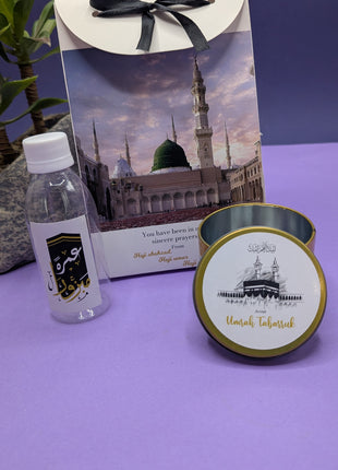 Hajj & Umrah Tabarruk Gift Set – Customized Bag, Tin Box & Zamzam Bottle (Complete Package)