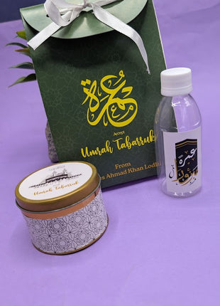 Hajj & Umrah Tabarruk Gift Set – Customized Bag, Tin Box & Zamzam Bottle (Complete Package)