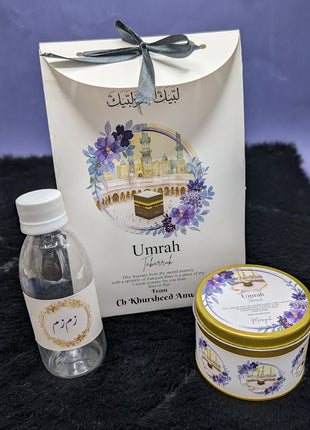 Hajj & Umrah Tabarruk Gift Set – Customized Bag, Tin Box & Zamzam Bottle (Complete Package)