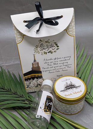 Hajj & Umrah Tabarruk Gift Set – Customized Bag, Tin Box & Zamzam Bottle (Complete Package)