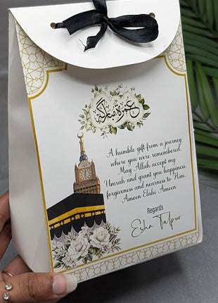 Hajj & Umrah Tabarruk Gift Set – Customized Bag, Tin Box & Zamzam Bottle (Complete Package)
