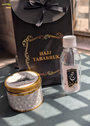 Hajj & Umrah Tabarruk Gift Set – Customized Bag, Tin Box & Zamzam Bottle (Complete Package)