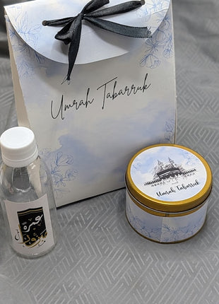Hajj & Umrah Tabarruk Gift Set – Customized Bag, Tin Box & Zamzam Bottle (Complete Package)