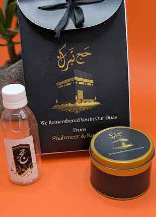 Hajj & Umrah Tabarruk Gift Set – Customized Bag, Tin Box & Zamzam Bottle (Complete Package)
