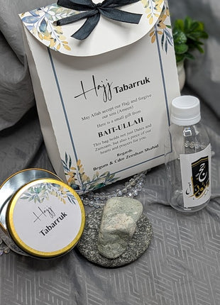 Hajj & Umrah Tabarruk Gift Set – Customized Bag, Tin Box & Zamzam Bottle (Complete Package)