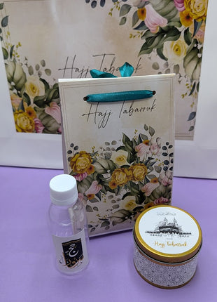 Hajj & Umrah Tabarruk Gift Set – Customized Bag, Tin Box & Zamzam Bottle (Complete Package)