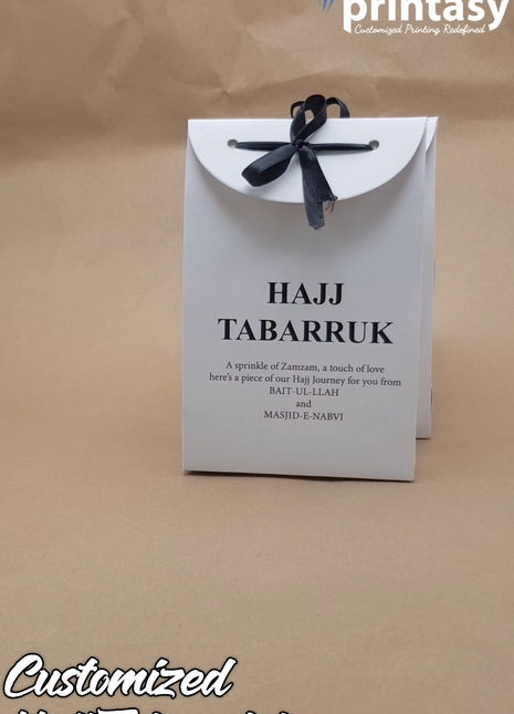 Hajj & Umrah Tabarruk Gift Set – Customized Bag, Tin Box & Zamzam Bottle (Complete Package)
