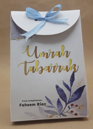 Hajj & Umrah Tabarruk Gift Set – Customized Bag, Tin Box & Zamzam Bottle (Complete Package)