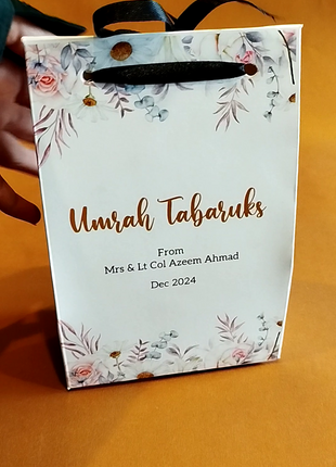 Hajj & Umrah Tabarruk Gift Set – Customized Bag, Tin Box & Zamzam Bottle (Complete Package)