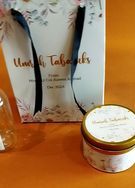 Hajj & Umrah Tabarruk Gift Set – Customized Bag, Tin Box & Zamzam Bottle (Complete Package)