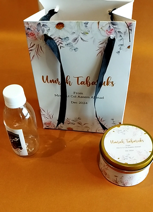 Hajj & Umrah Tabarruk Gift Set – Customized Bag, Tin Box & Zamzam Bottle (Complete Package)
