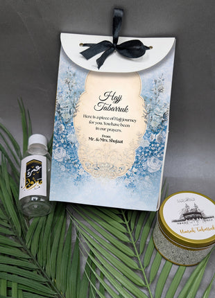 Hajj & Umrah Tabarruk Gift Set – Customized Bag, Tin Box & Zamzam Bottle (Complete Package)