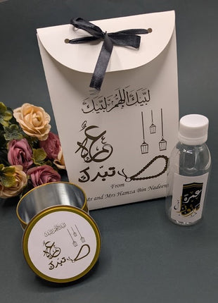 Hajj & Umrah Tabarruk Gift Set – Customized Bag, Tin Box & Zamzam Bottle (Complete Package)