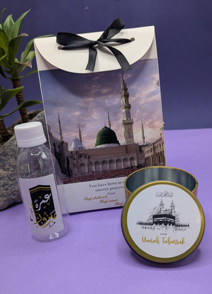 Hajj & Umrah Tabarruk Gift Set – Customized Bag, Tin Box & Zamzam Bottle (Complete Package)