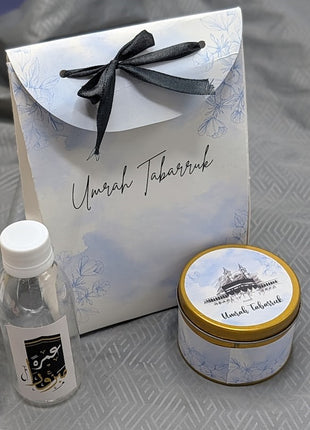 Hajj & Umrah Tabarruk Gift Set – Customized Bag, Tin Box & Zamzam Bottle (Complete Package)
