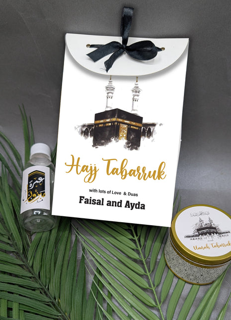 Hajj & Umrah Tabarruk Gift Set – Customized Bag, Tin Box & Zamzam Bottle (Complete Package)